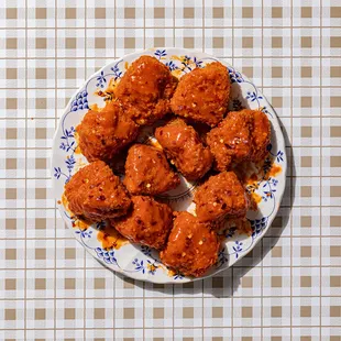 a plate of fried chicken wings