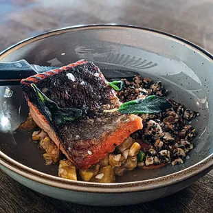 Steelhead trout. Heirloom succotash, marcona almond, furikake, romesco, sage.  (Fish is cooked to perfection with crispy skin outside)