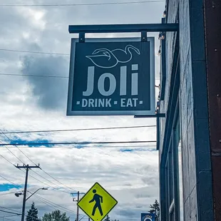 a sign for a drink and eat restaurant