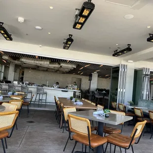 Interior dining opens to exterior