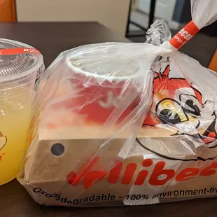 Palabok fiesta with 2 pcs Chickenjoy and pineapple juice
