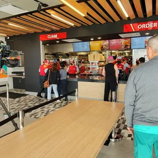 a group of people in a fast food restaurant
