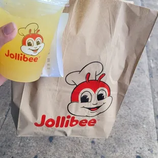 Pineapple juice and chicken sandwich in the bag