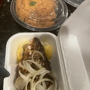 Fish and jollof rice- I took it to go. It was delicious.