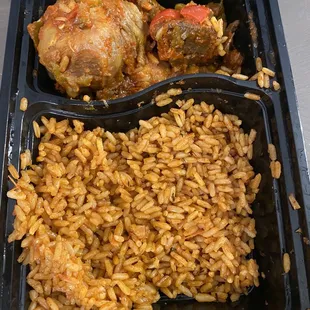 Goat, chicken, Jollof Rice Fried Plantain Protein half eaten (my bad took picture late).