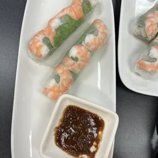 Spring rolls with peanut sauce.
