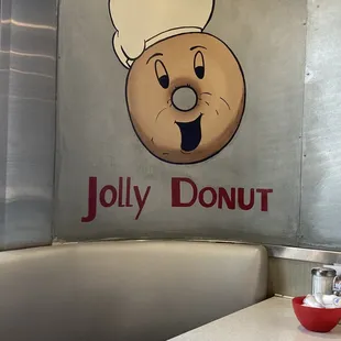 a sign for jolly donut