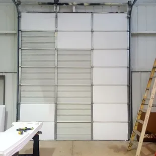 Insulating a commercial door