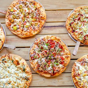 Variety of pizzas ready to enjoy, or build your own at Jolly Ollie&apos;s Pizza and Pub in Hendersonville, TN
