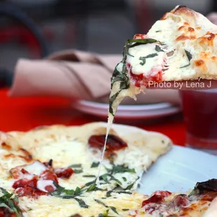 Margherita Pizza ($16) - like cheese bread with a few sun-dried tomatoes. Meh.