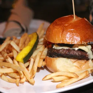 JP Burger ($17) - custom blend of grass fed beef, cambozola cheese, cremini mushrooms, bacon, tomato, challah roll