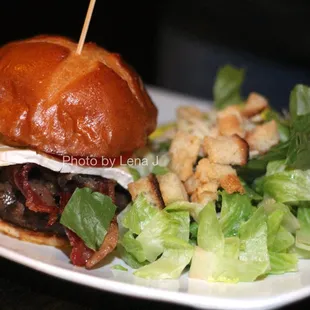 JP Burger ($17) - custom blend of grass fed beef, cambozola cheese, cremini mushrooms, bacon, tomato, challah roll