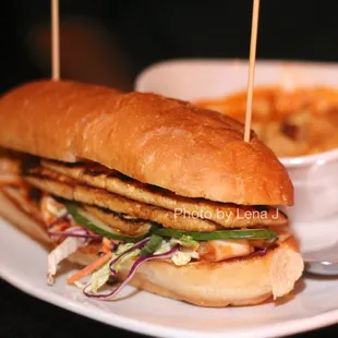 Tofu Bibimbap Sandwich ($14.50) - seared marinated tofu, kimchi, cucumber slaw, sesame seeds, bibimbap sauce, sambal mayo