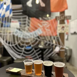 a flight of beers on a table