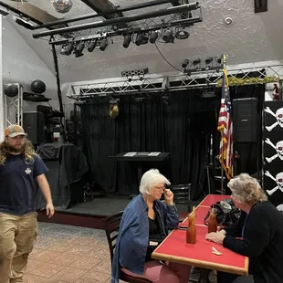 The karaoke stage next to the bar.