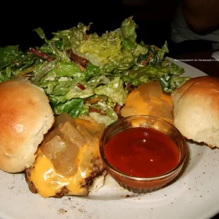 Lil&apos; Jolly Combo - a pair of our sliders served on our own Lil&apos; Jolly buns. Jolly Roger Habanero BBQ + Caesar salad on the side.