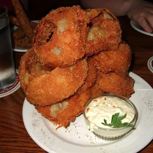 Smokers.  Hand-cut onion rings smoked with apple wood + hops, double breaded + fried, served with roasted jalapeño tartar sauce.