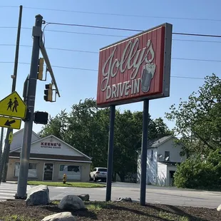 a sign for jolly&apos;s drive - in