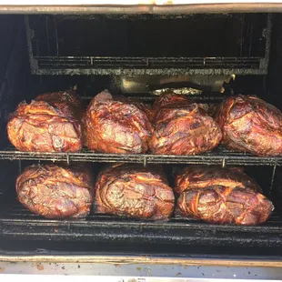Smoking our award winning pork over cherry wood!