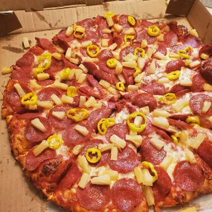 Pineapple, banana pepper and pepperoni pizza