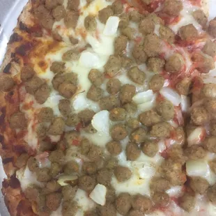 a sausage and cheese pizza