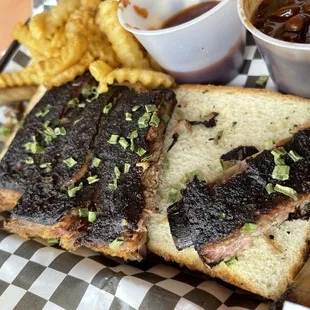 Ribs were amazing.  No sauce needed, bark was best alone.