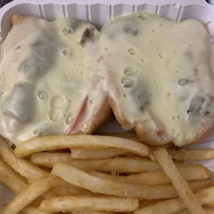 Philly Steak and Cheese Grinder, with fries