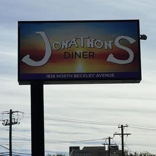 a sign for jonathon's diner