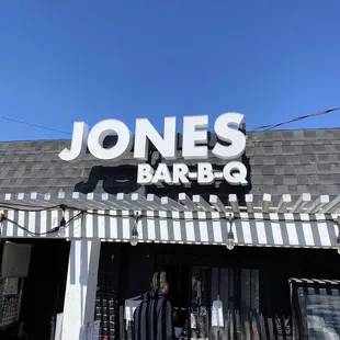 ows the front of jones bar - b - q