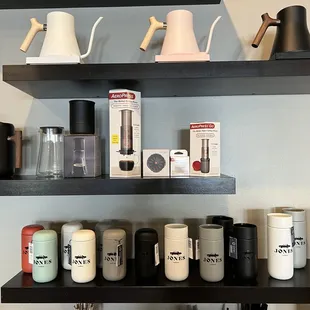 a variety of coffee pots and mugs
