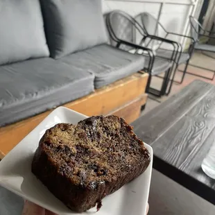 Banana bread enjoyed on their covered outdoor seating