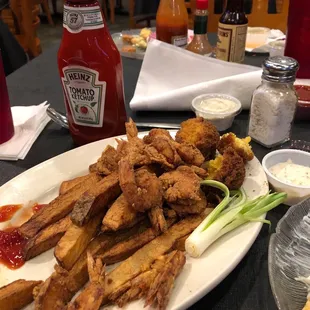 my shrimp was over fried, second time here, not pleased. The server is rude, I think she don't like BLACK people.