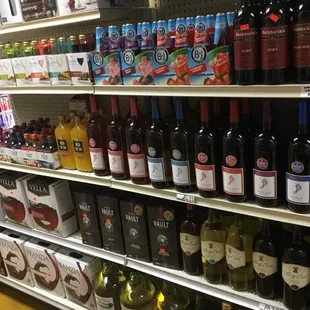 a variety of wines on shelves