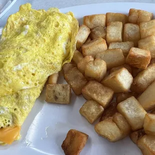 Cheese omelet and home fries