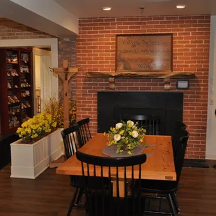 a dining room with a fireplace