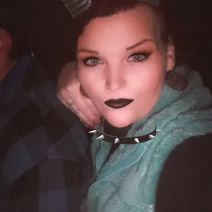 a woman with horns on her head