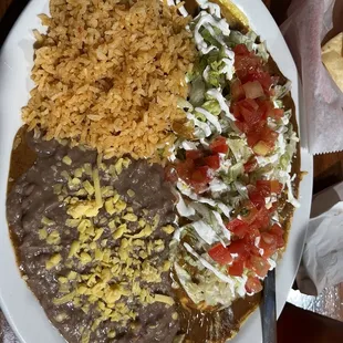 Enchilada dinner, large added lettuce tomato &amp; sour cream