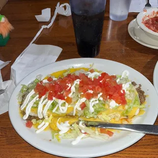Burrito, large, ground beef, added lettuce tomato &amp; sour cream