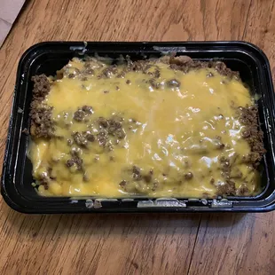 This is a large nacho to go?? Ridiculously small!