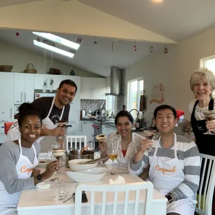 Team Members eating our delicious meal with Chef Joni