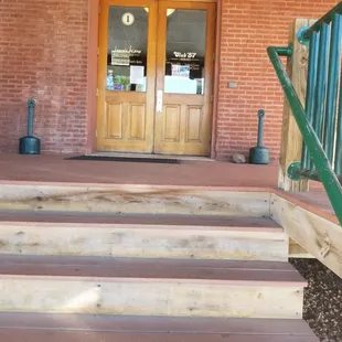 the entrance to a brick building