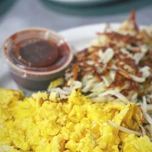 Scrambled eggs and hash browns with house salsa