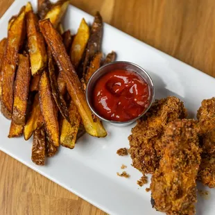 Hand-breaded chicken tenders and homestyle fries