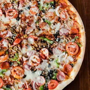 Supreme pizza!! One of our most popular items