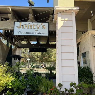 Outside - there are benches for waiting after you order your food