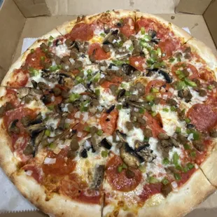 Pizza supreme - sparse on toppings