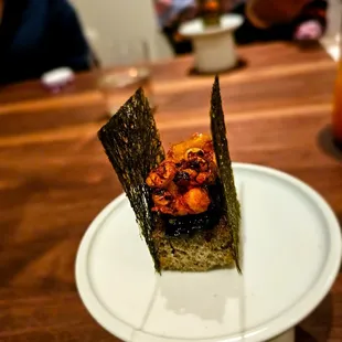 Makgeolli- Makgeolli bread, eel, sweet corn, and gamtae bugak. Excellent course. One of the best