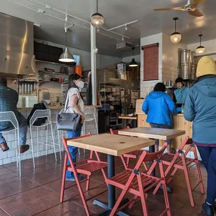 a group of people in a restaurant