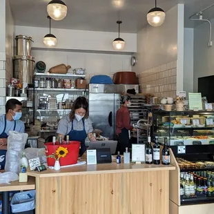 a group of people in a kitchen