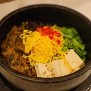 a bowl of food on a table